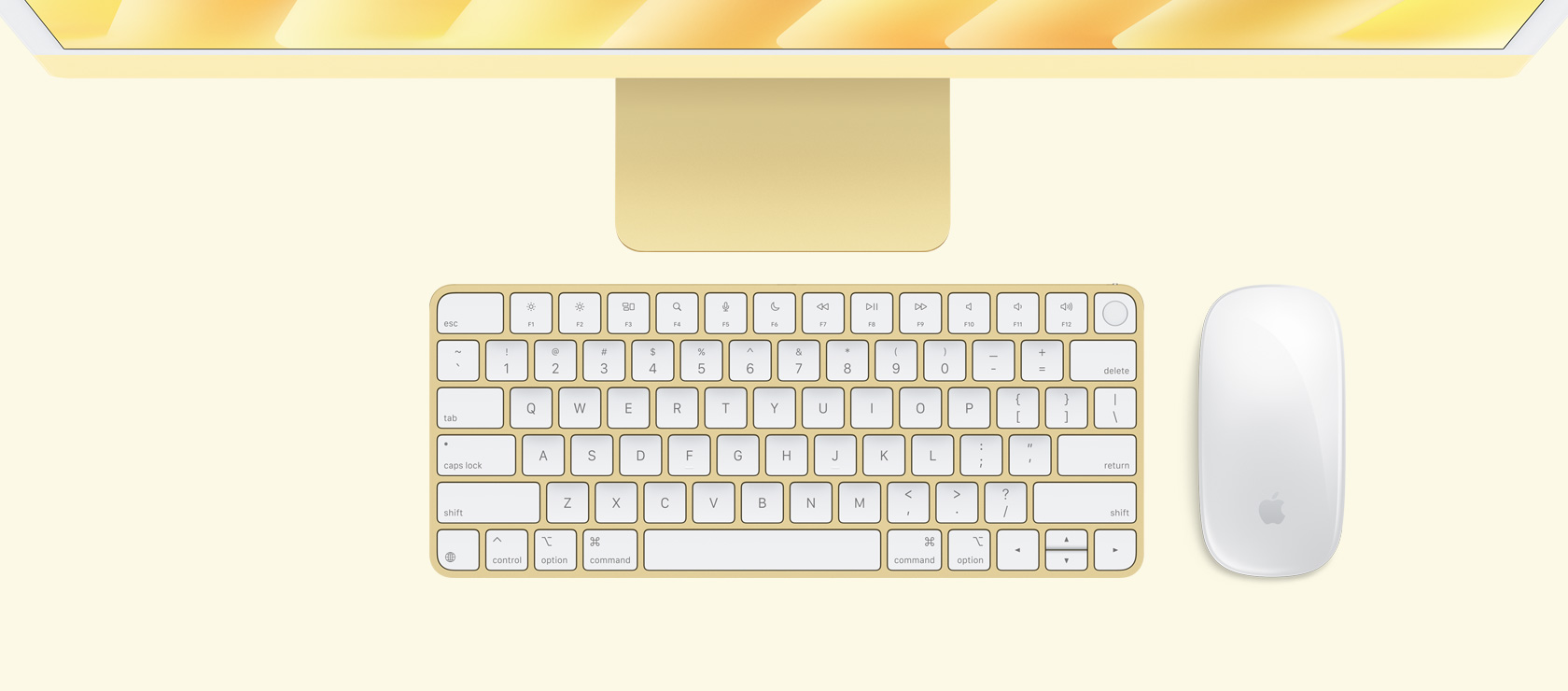 Imagem aérea de um iMac amarelo com mouse e keyboard na mesma cor